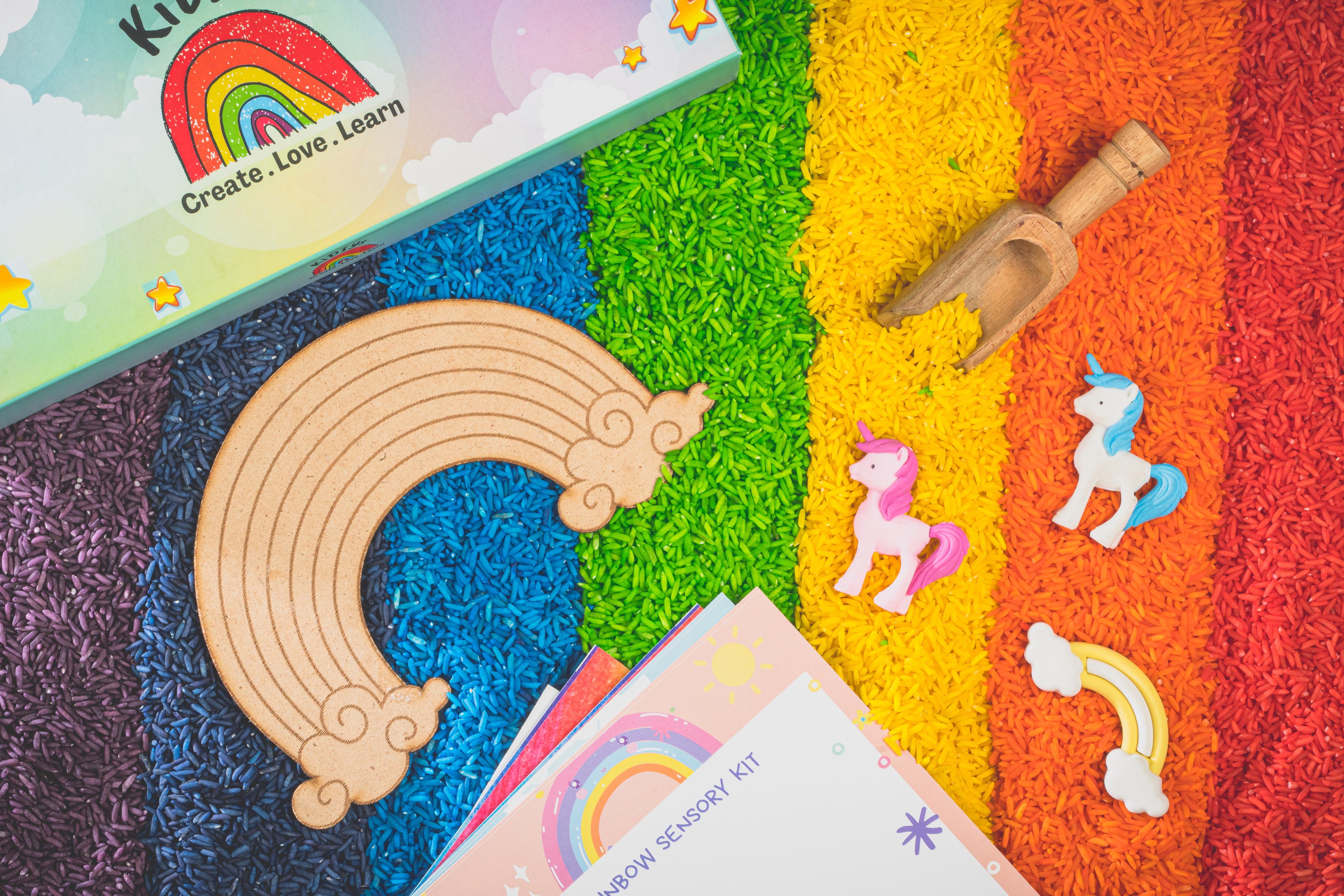 Rainbow rice sensory kit with wooden tool